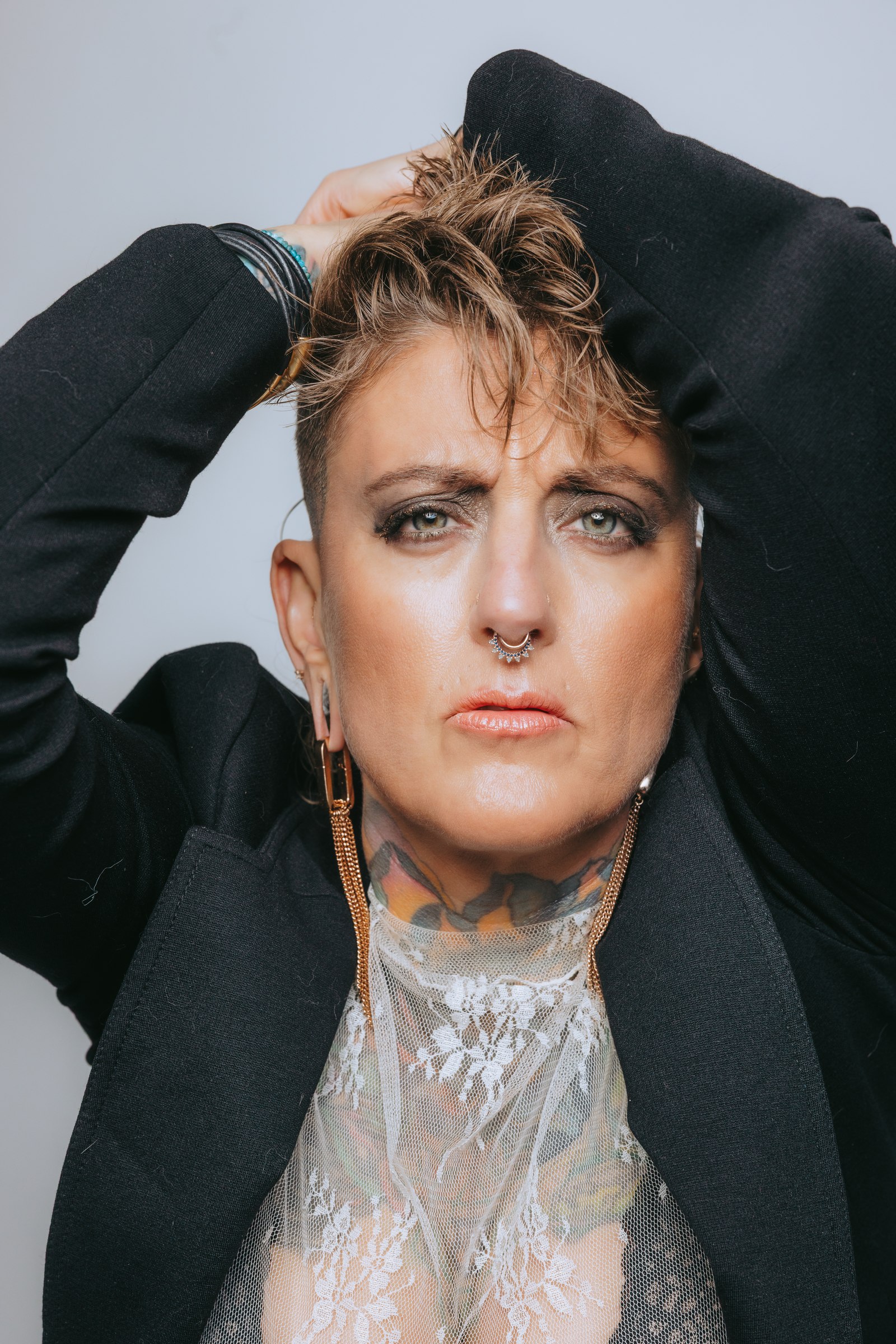 Close-up editorial portrait of Chari with dramatic makeup