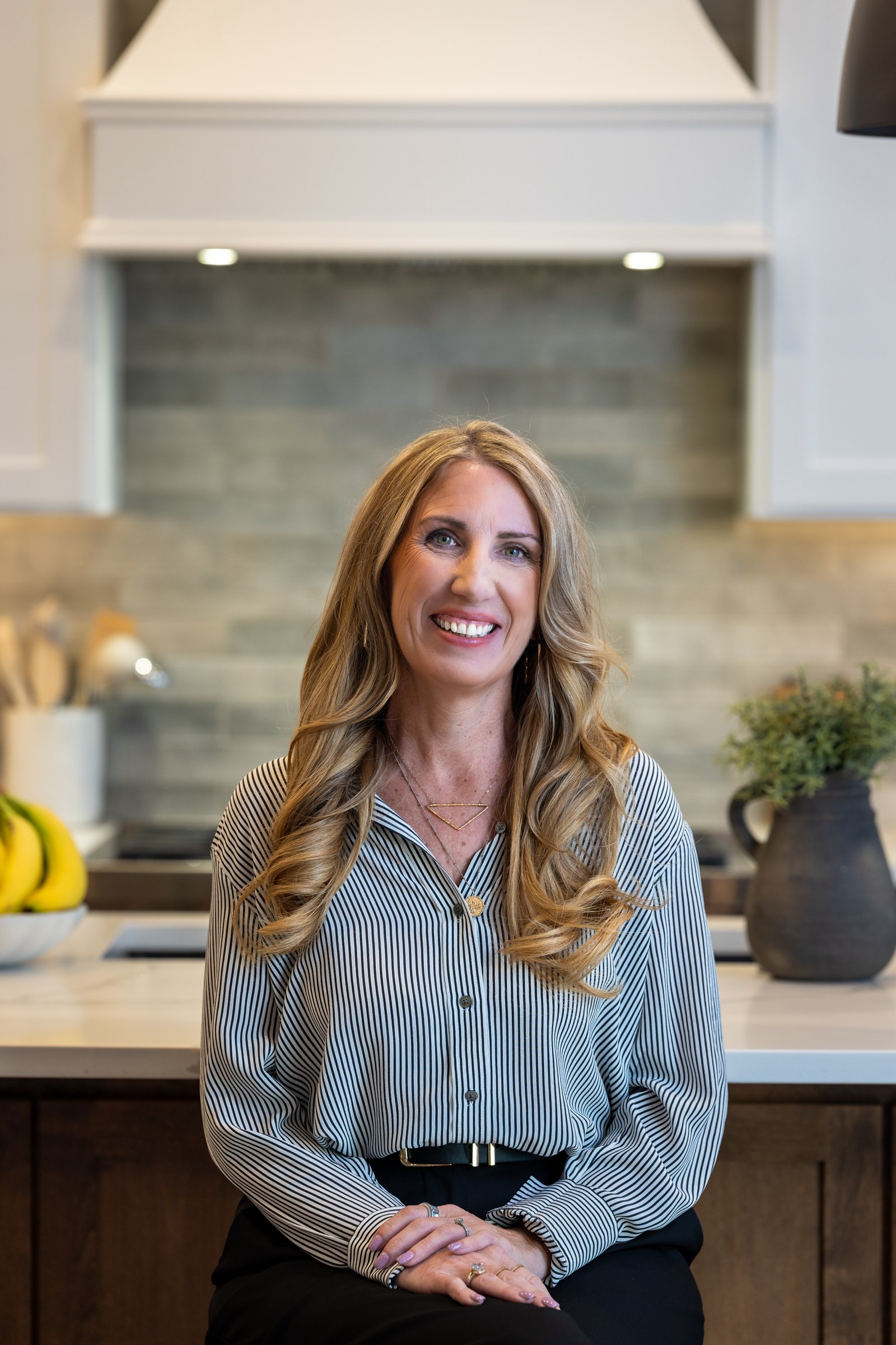 Female team member, professional indoor headshot
